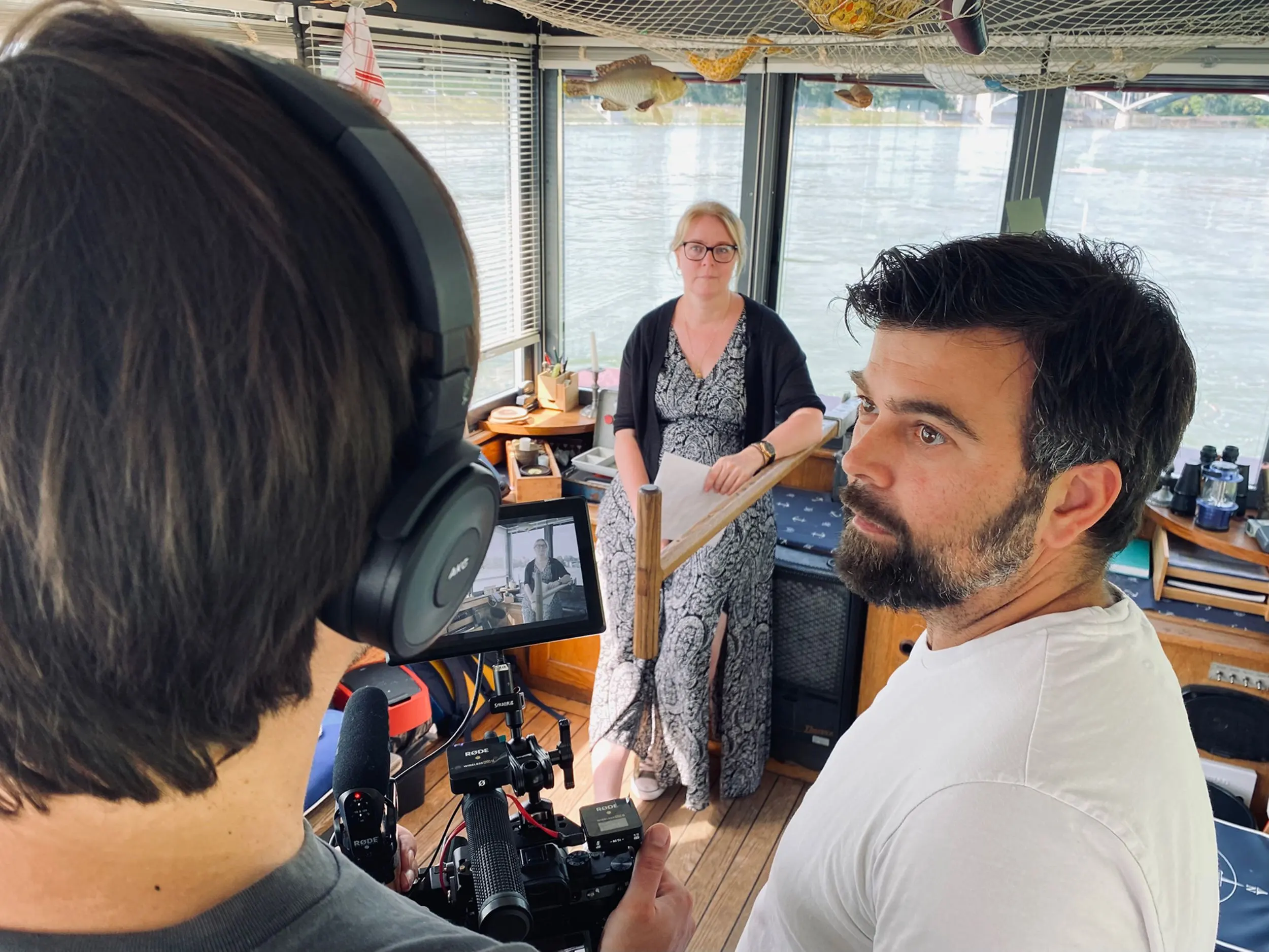 Tumasch Clalüna und Martin Sauter von eyeloveyou sowie Martina Meinicke auf der Fähre